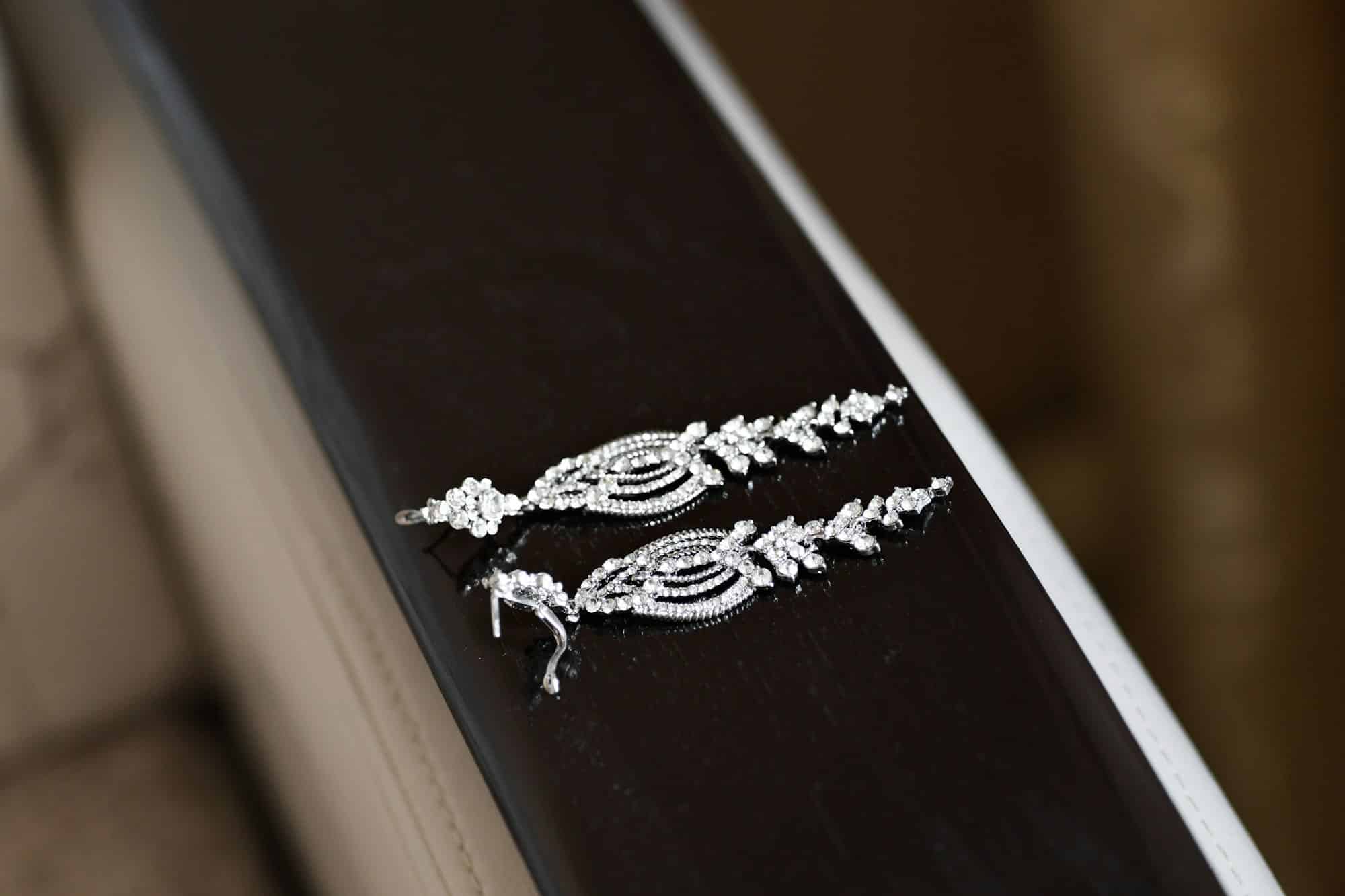 pair of silver earrings