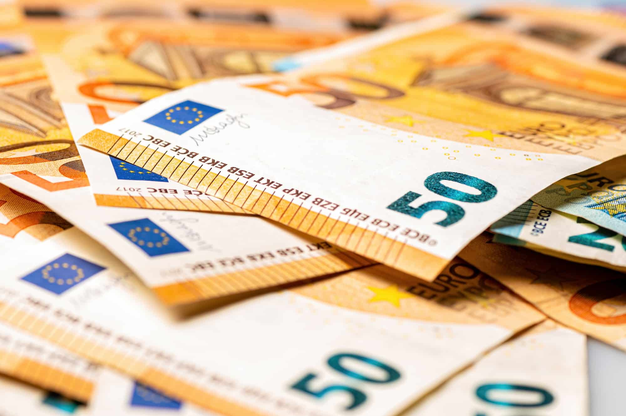 Money background from 50 and 20 euro banknotes. Euro banknote closeup